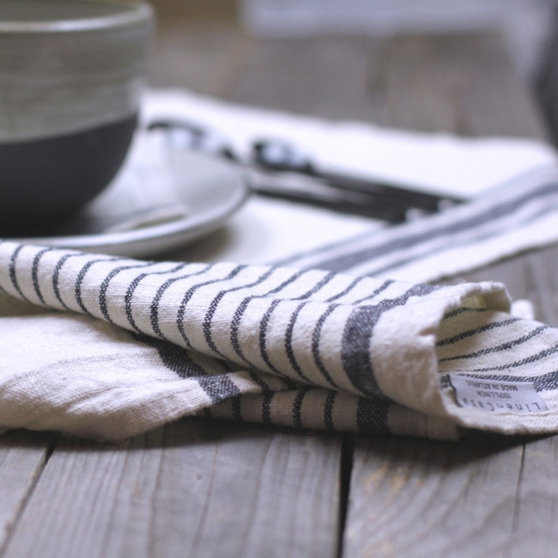 Linen Kitchen Towel lifestyle table lay detail product shot in color Black with White Stripe by LinenCasa for South Hous.