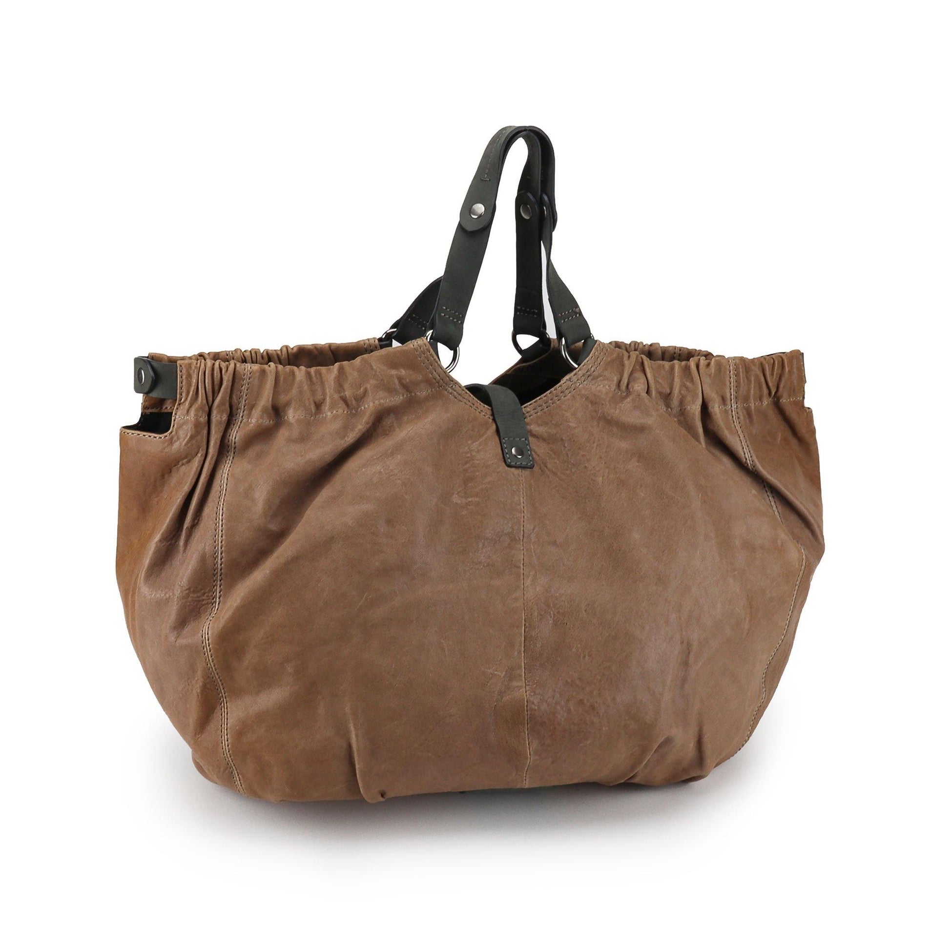 SOUTH HOUS EXCLUSIVE Bernardo Weekender to get your freakender on! Spacious and slouchy like an extended seat after a long ass weekend jumping a flight from NYC to the Dirty South. In downtown julie brown to match the mood from the other view