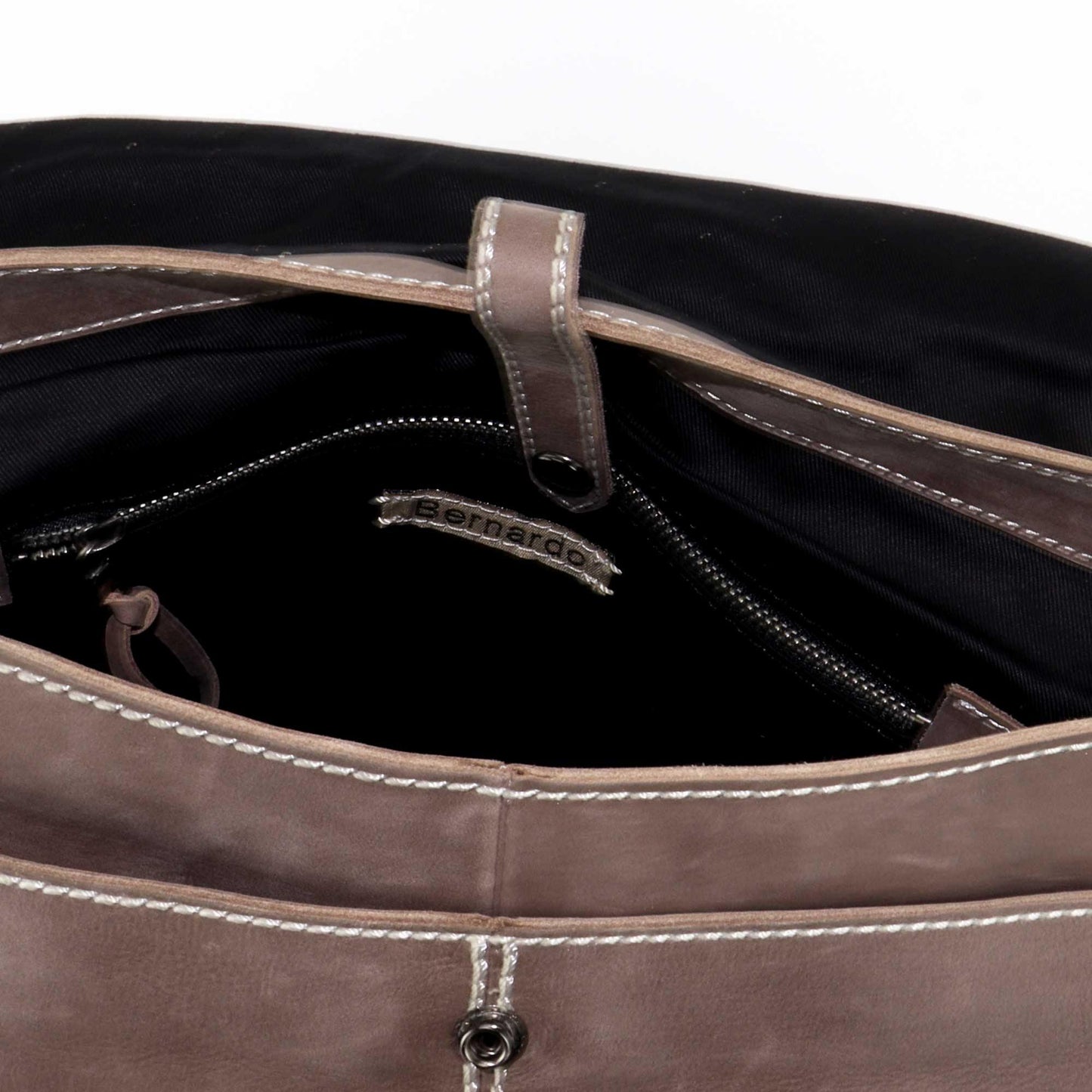 SOUTH HOUS EXCLUSIVE Bernardo Nubuck Leather Messenger crossbody satchel with fold over flap, double ring, and rivet deliver the news while stashing the booze the deep view