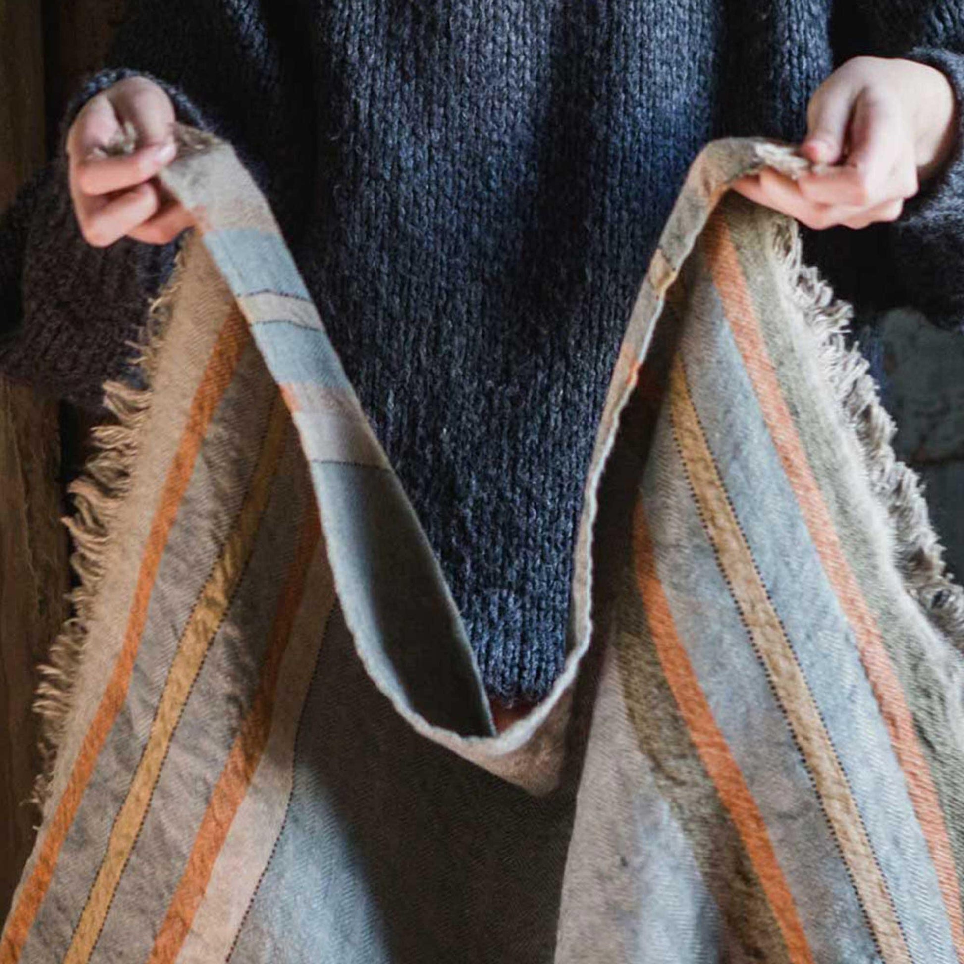 Belgian linen fouta throw blanket lifestyle product shot in color Multi Stripe by Libeco for South Hous.