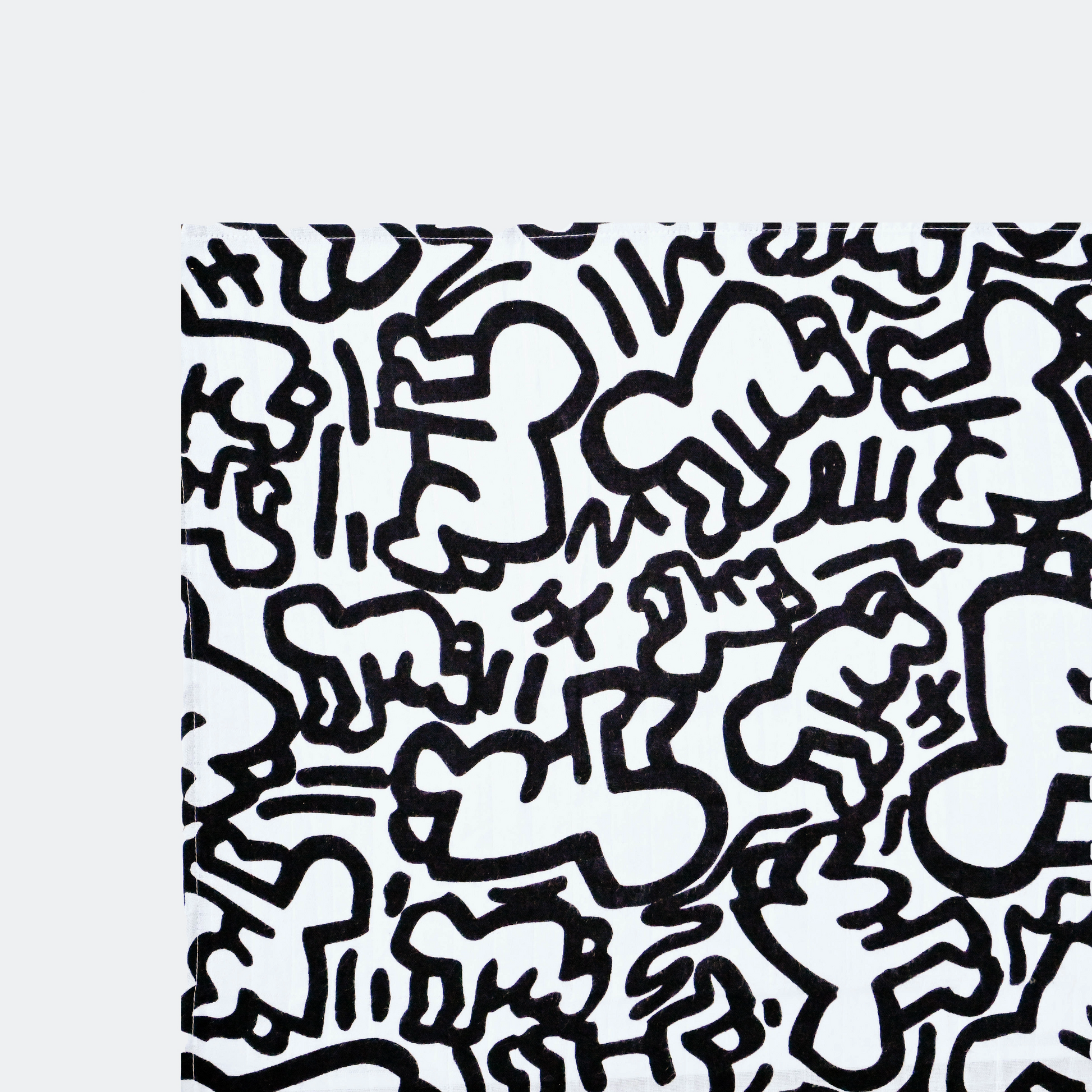 Keith Haring Pop Art Print Muslin Squares blanket lovey product shot in color Black & White by Etta Loves for South Hous.