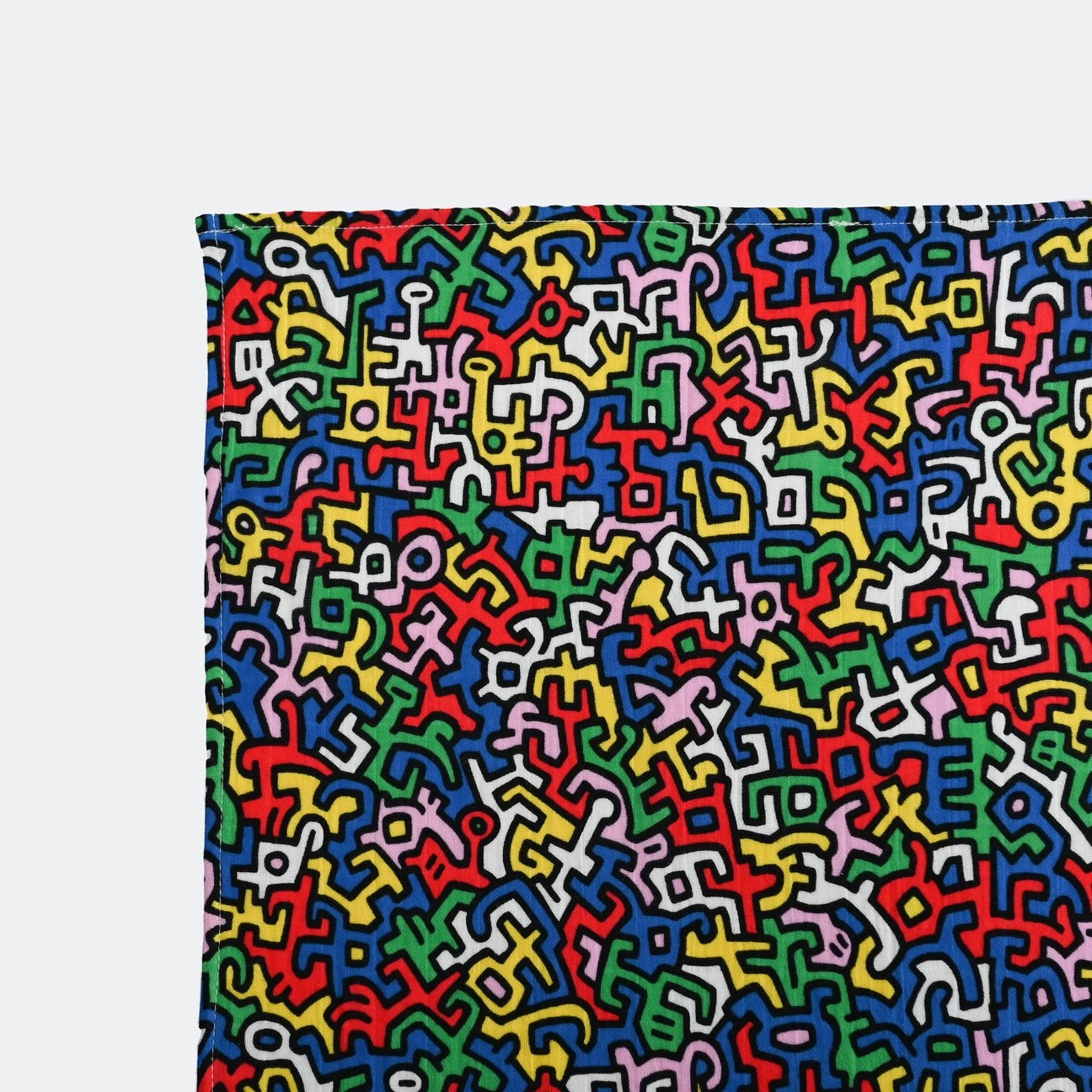 Keith Haring Pop Art Print Muslin Squares blanket lovey product shot in color Brazil Primary by Etta Loves for South Hous.