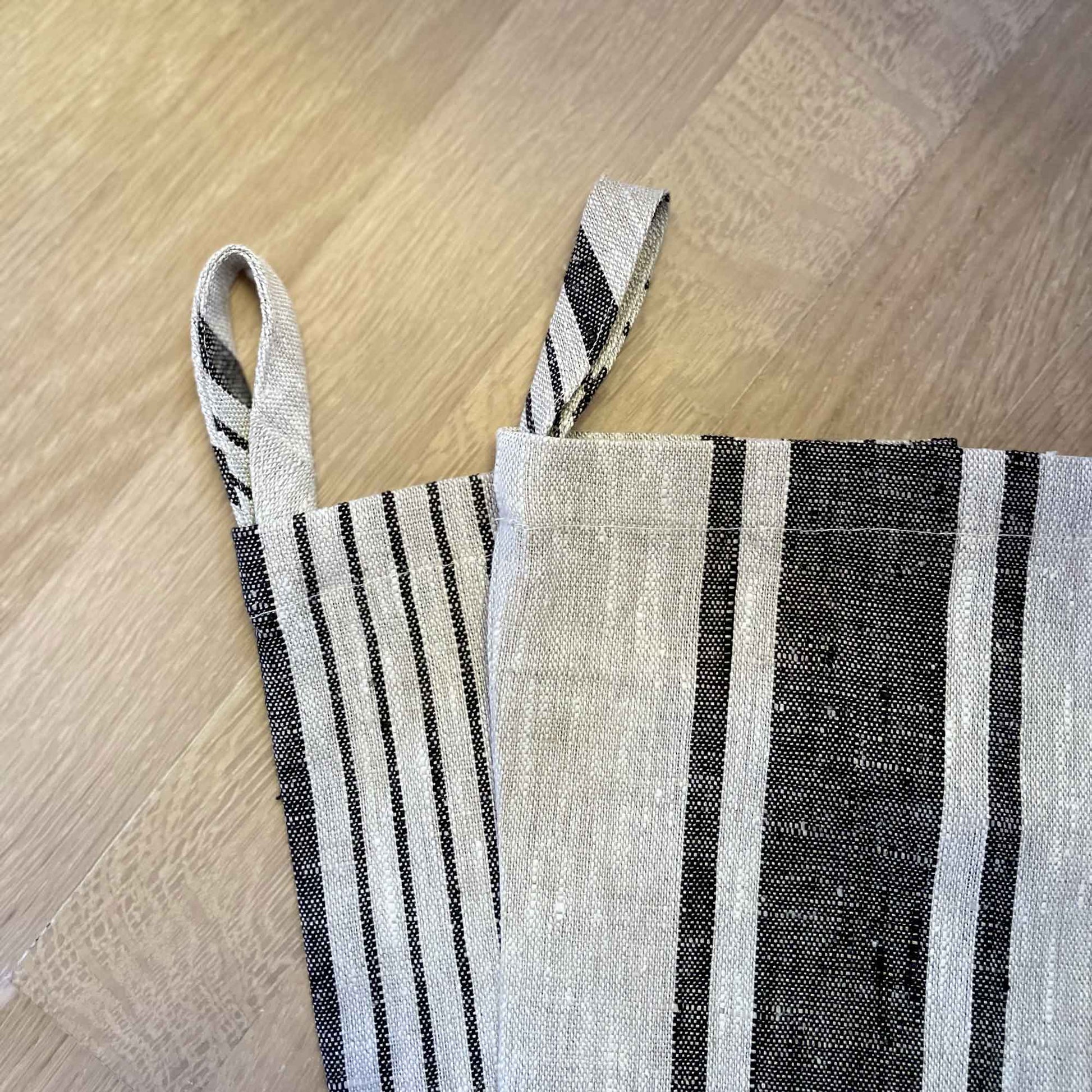 South Hous Scandinavian style Linen Holiday Stockings flat stack detail product shot in pin and medium stripe.