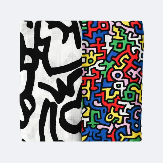 Keith Haring Pop Art Print Muslin Blanket Pair in color Black & White and Brazil Primary by Etta Loves for South Hous.