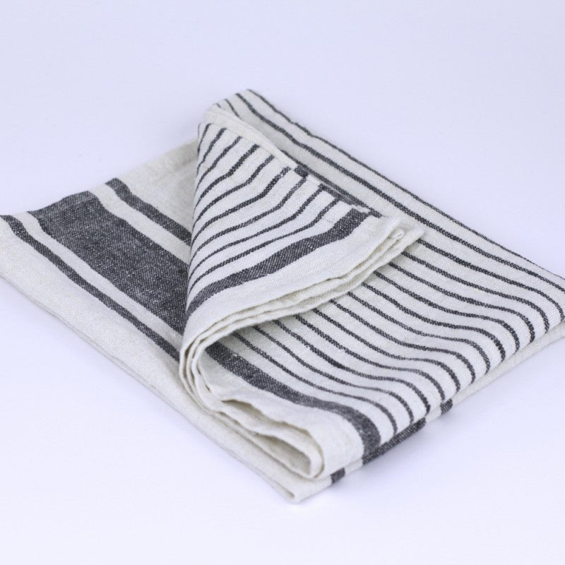 Linen Kitchen Towel flat lay fold detail product shot in color Antique White with Black Stripe by LinenCasa for South Hous.
