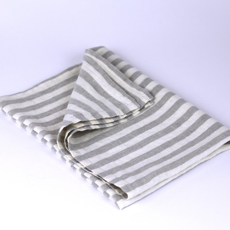 Linen Kitchen Towel flat lay fold detail product shot in color Grey with White Medium Stripe by LinenCasa for South Hous.