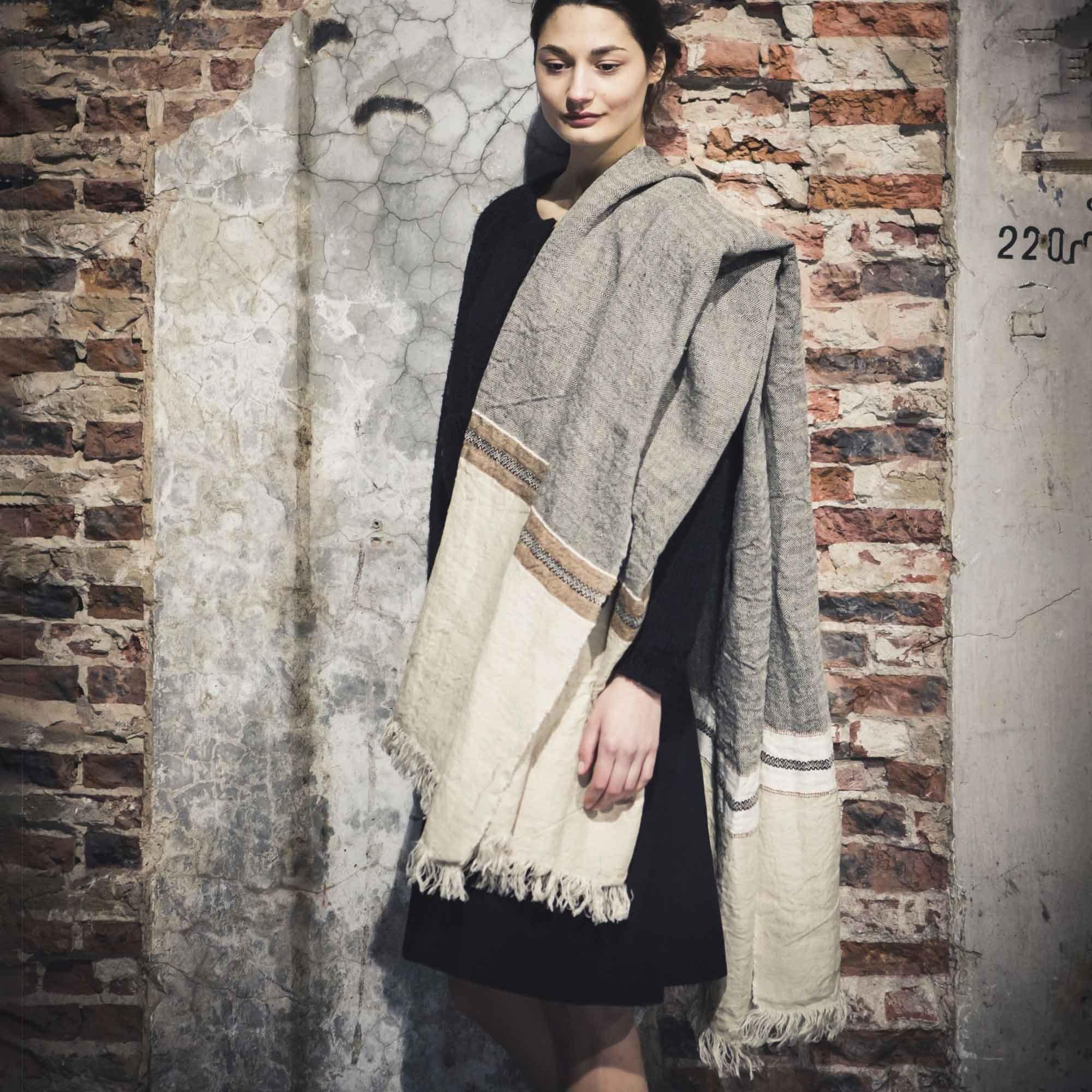 Belgian linen fouta throw blanket lifestyle product shot in color Beeswax by Libeco for South Hous.