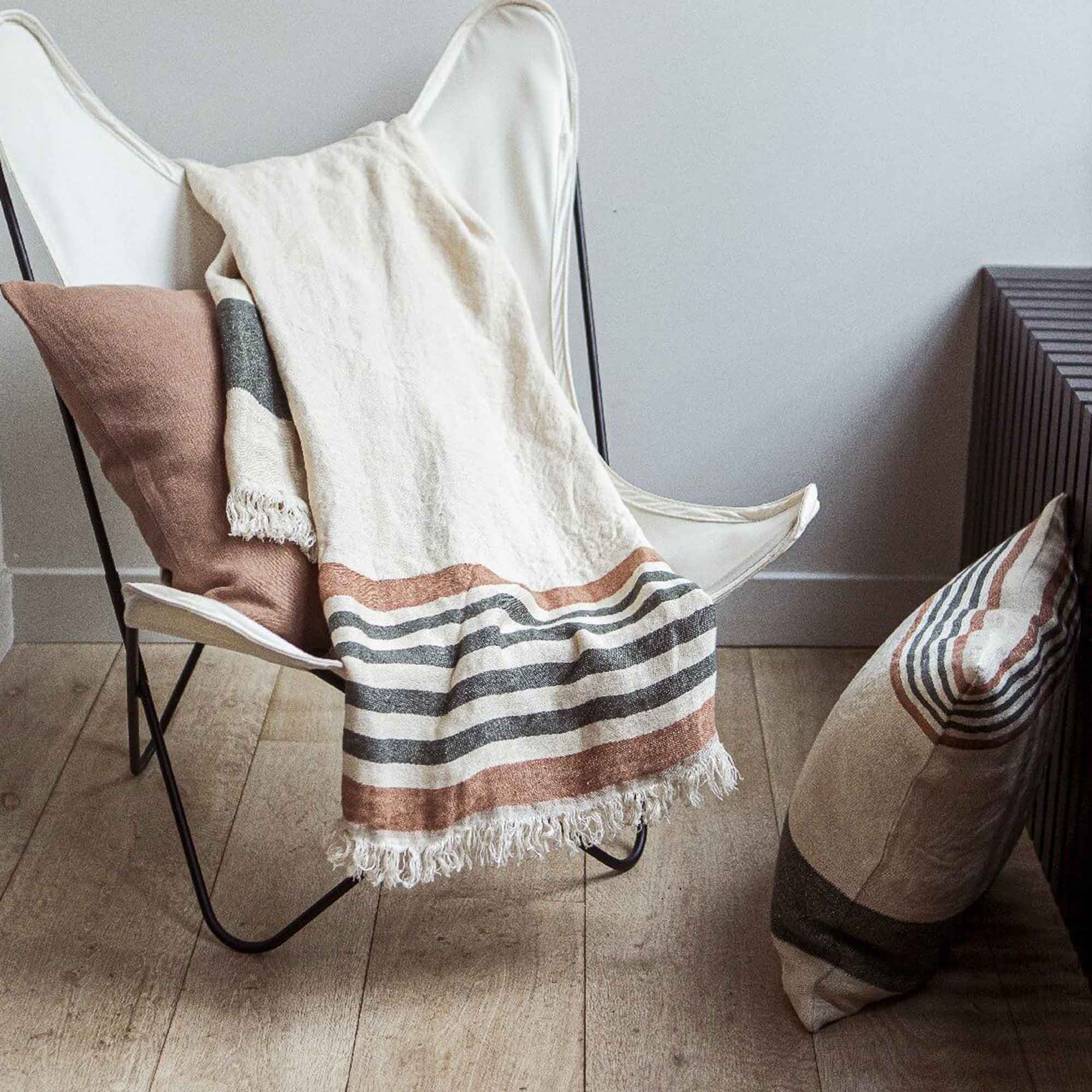 Belgian linen fouta throw blanket lifestyle product shot in color Laguna Verde by Libeco for South Hous.