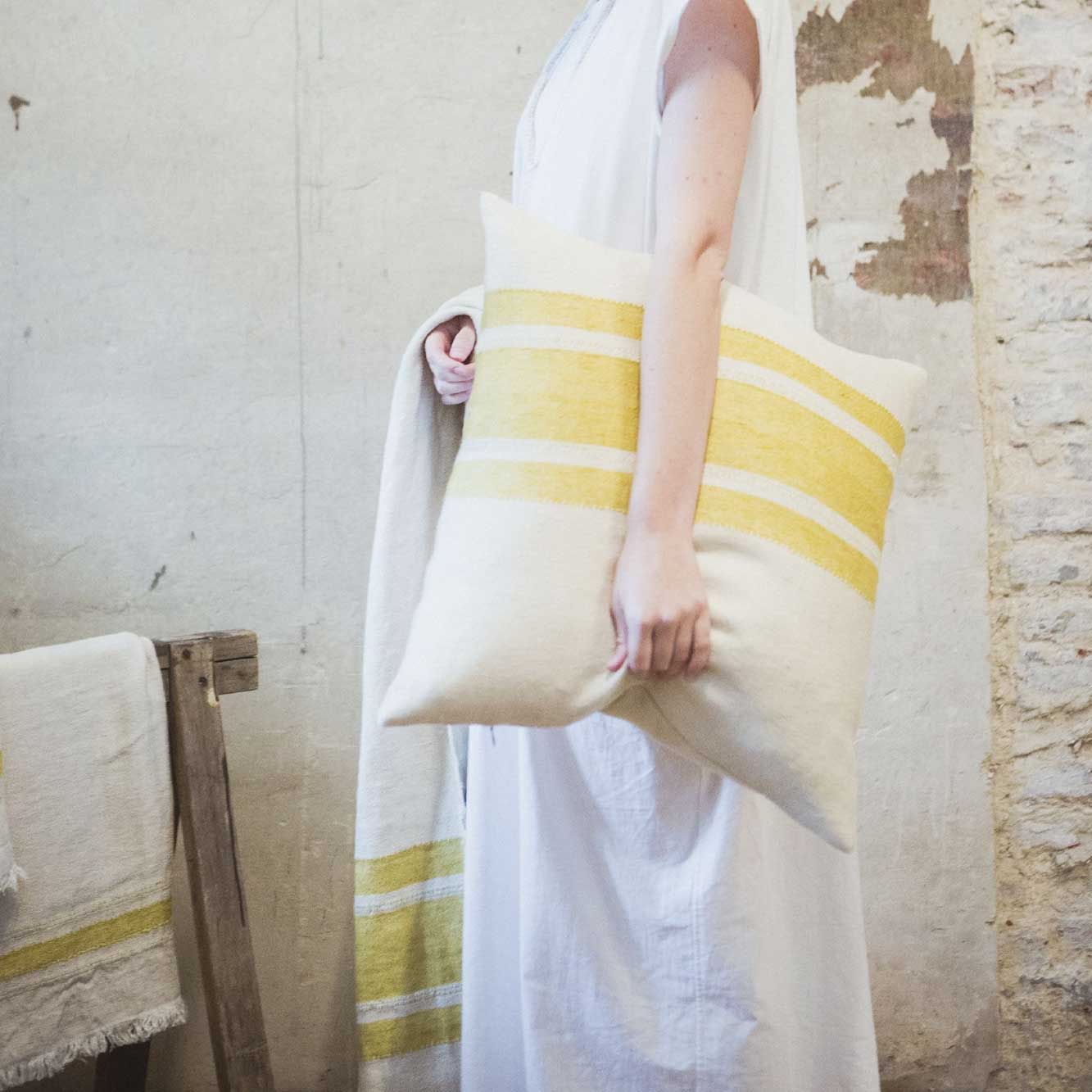 Belgian linen throw blanket and pillow cover set product shot in color Mustard Stripe by Libeco for South Hous.