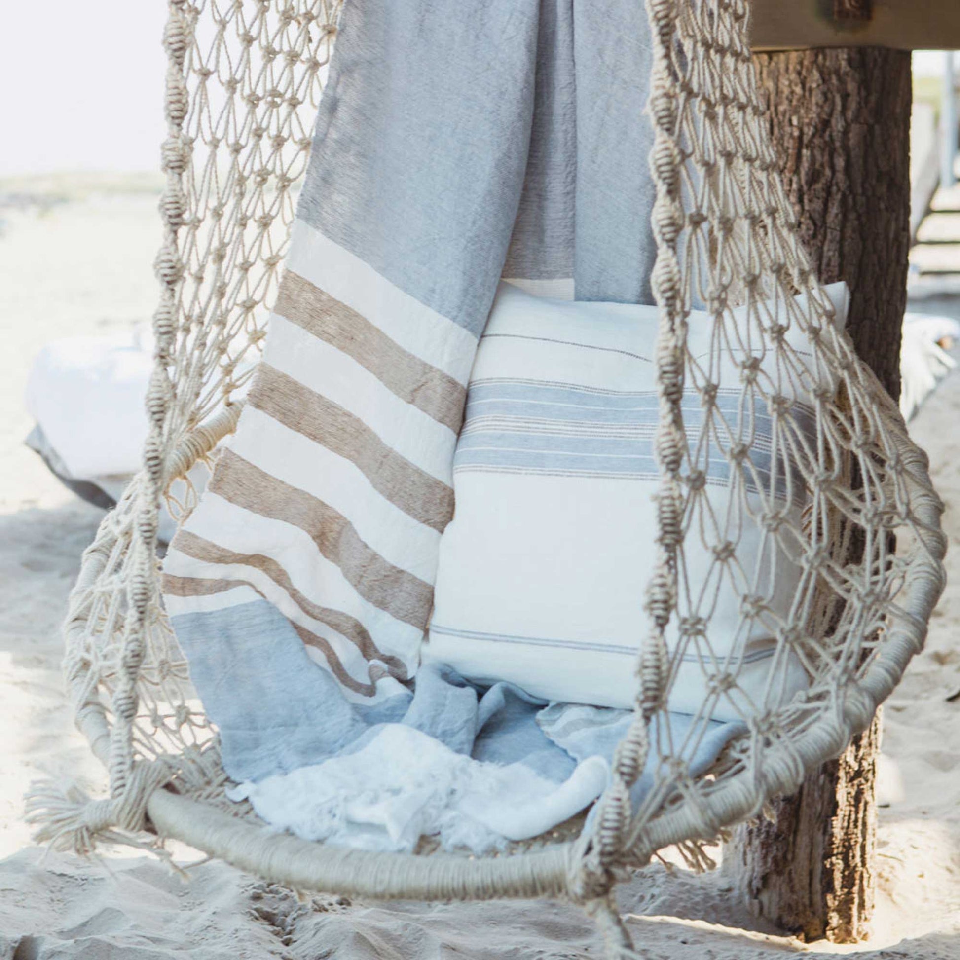 Belgian linen fouta throw blanket lifestyle product shot in color Ash by Libeco for South Hous.