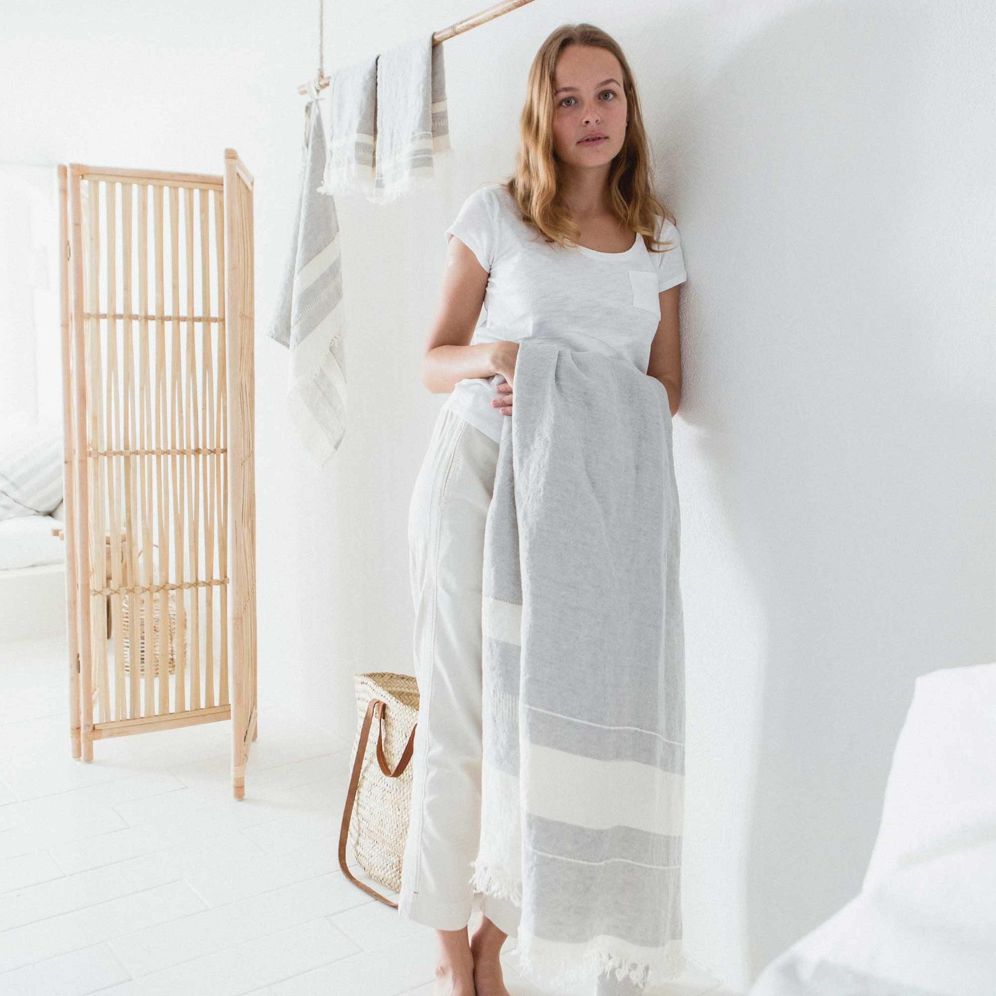 Belgian linen fouta throw blanket lifestyle product shot in color Gent Stripe by Libeco for South Hous.