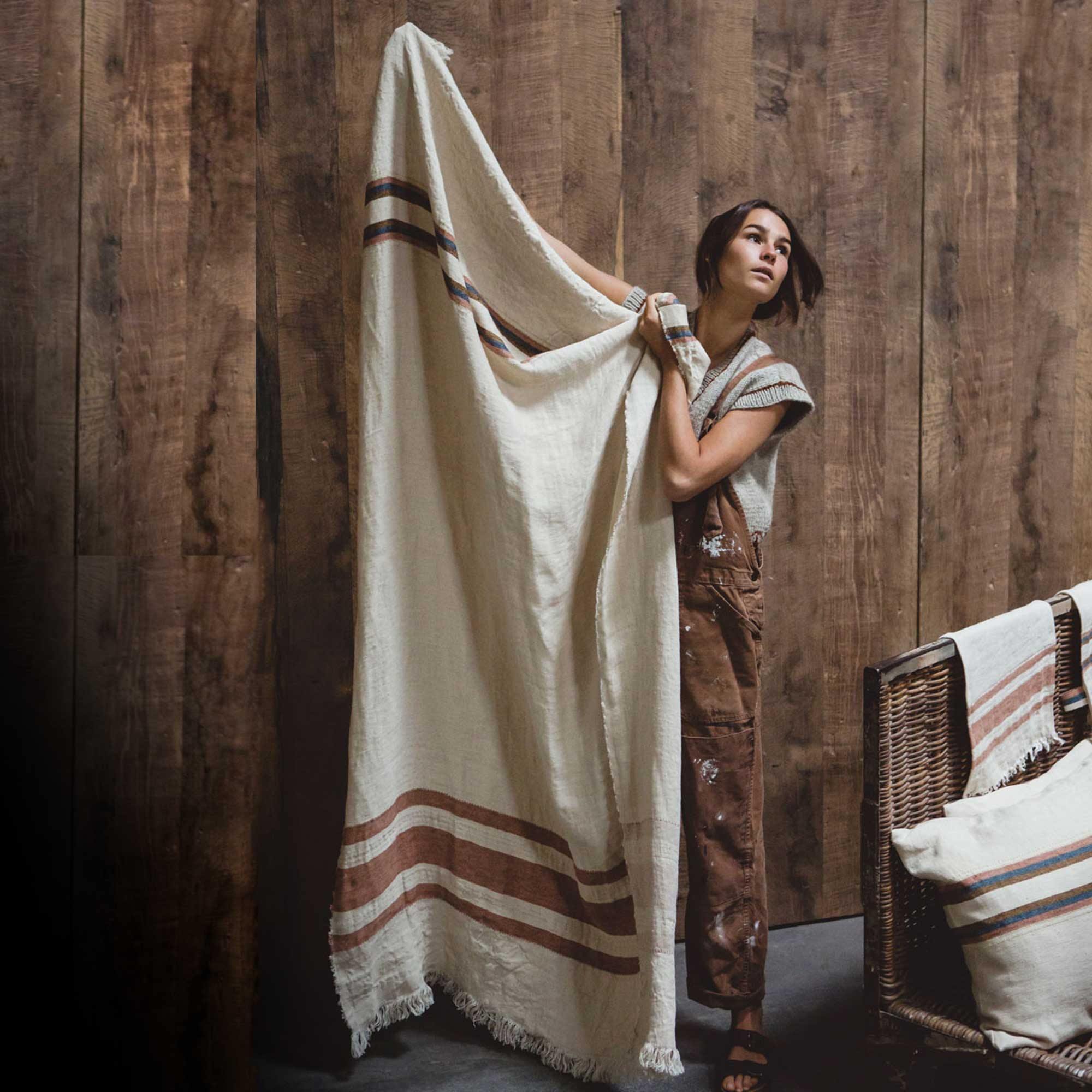 Belgian linen fouta throw blanket lifestyle product shot in color Harlan by Libeco for South Hous.