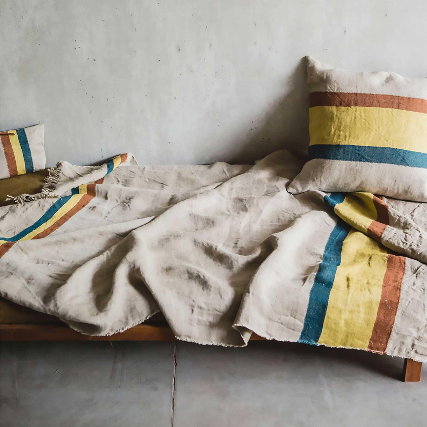 Belgian linen fouta throw blanket lifestyle product shot in color Mercurio by Libeco for South Hous.