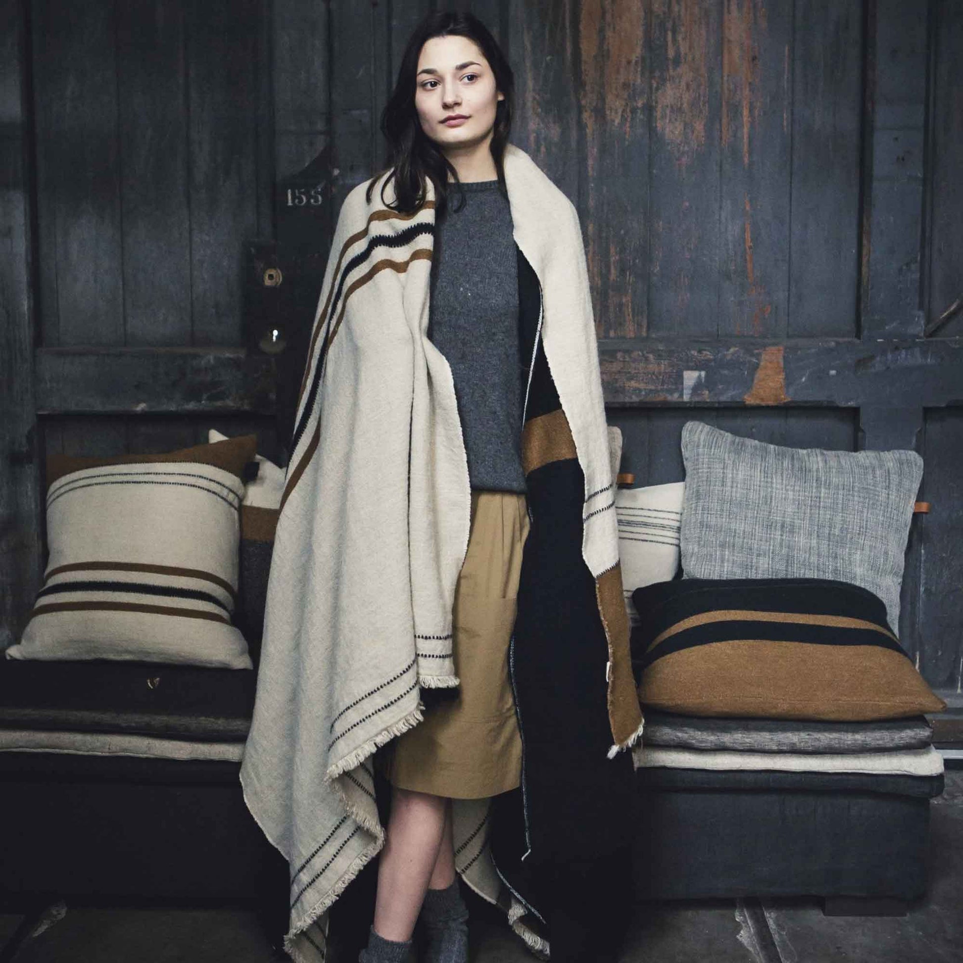 Linen and wool blend throw blanket lifestyle wide product shot in color Foundry by Libeco for South Hous.