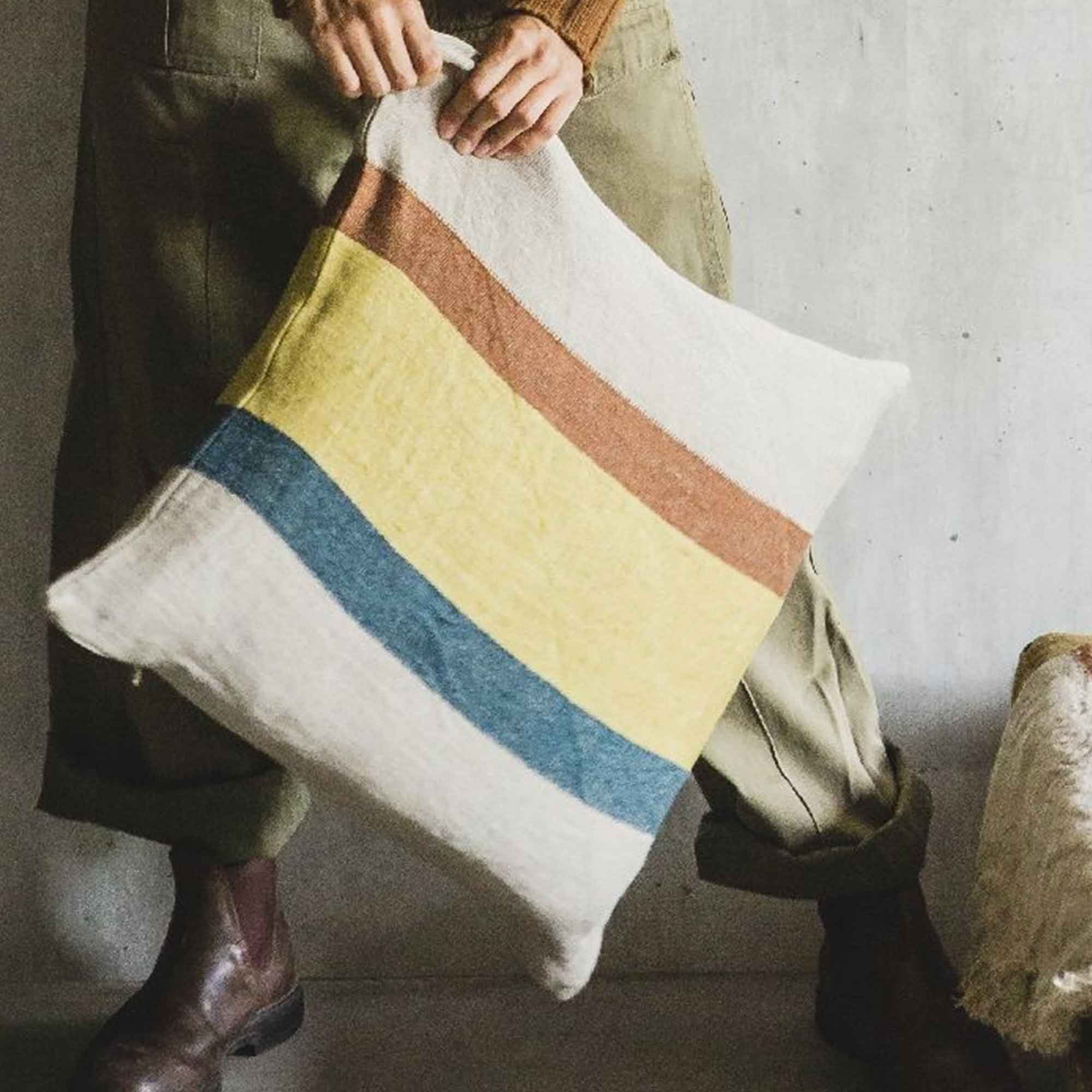 Belgian linen throw pillow cover lifestyle product shot in color Mercurio by Libeco for South Hous.