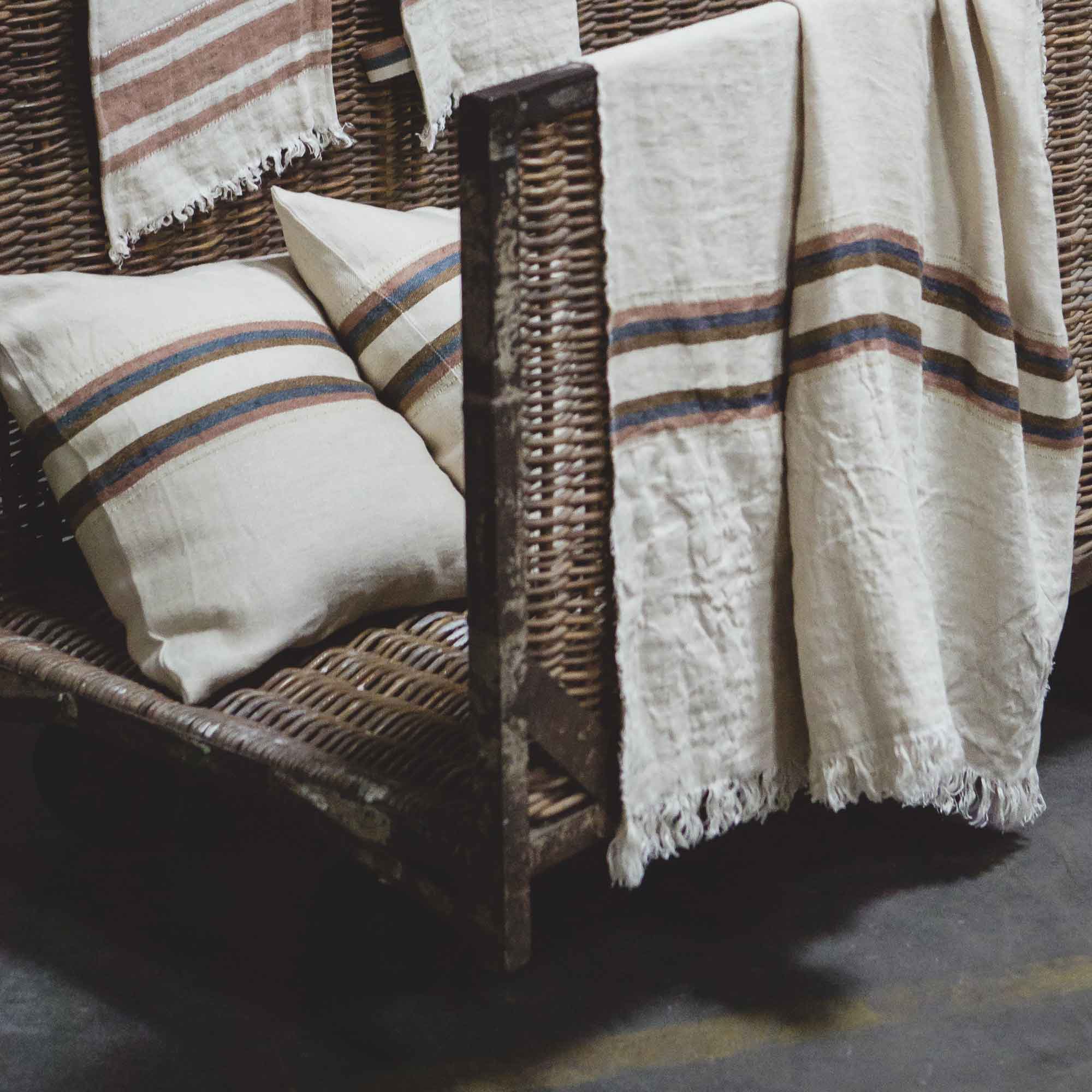 Belgian linen throw blanket and pillow cover set product shot in color Harlan by Libeco for South Hous.